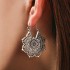 European and American foreign trade jewelry retro ethnic style metal hollow flower earrings Bohemian carved flower earrings