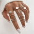 Cross border hot selling diamond studded eye cross leaf ring multi joint 23 piece set pearl sun moon ring