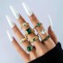 Cross border retro, personalized, fashionable metal imitation emerald, diamond studded heart-shaped snake shaped ring, multi piece set for women in Europe and America