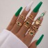 Cross border retro, personalized, fashionable metal imitation emerald, diamond studded heart-shaped snake shaped ring, multi piece set for women in Europe and America