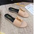 High end 2024 summer new one-piece slippers for women wearing flat bottomed metal letter buckle low heel foreign trade sandals