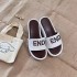 F letter embroidered slippers for women wearing thick soled slope and waterproof platform, versatile sponge cake with a single strap and height increasing grass woven slippers