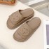 New European and American letter high-end height increasing slippers, fashionable thick soled sponge slippers, one line women's outdoor beach sandals