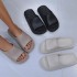 Height increasing and thick soled slippers for women's summer fashion, with arch support and a single line of slippers. Soft sole with a poop like feel. Coconut slippers