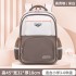 New primary school students' backpacks for boys and girls in grades three to six, with large capacity, lightweight, reduced load, spine protection, waterproof, children's backpacks