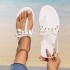 Cross border hot selling European and American foreign trade summer new flat bottomed PVC beach flip flops sandals anti slip PVC bow tie