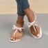 Cross border hot selling European and American foreign trade summer new flat bottomed PVC beach flip flops sandals anti slip PVC bow tie