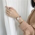 New fashion steel strip women's watch, student style simple retro ins style Korean version disc-shaped niche watch