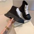 2021 new McQueen high top canvas shoes for women and couples, thick soled sponge cake white shoes, sporty and slim dad shoes, trendy