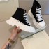 2021 new McQueen high top canvas shoes for women and couples, thick soled sponge cake white shoes, sporty and slim dad shoes, trendy