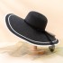 Summer black and white color blocked hollow ribbon versatile beach eaves letter embroidery sunscreen women's UV resistant straw hat