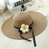 Wholesale of sun protection hats in scenic spots, children's summer beach flowers, bow grass hats, seaside sun hats