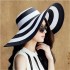 Summer women's sun hat Korean version new classic black and white striped big edge beach straw hat sunscreen sun hat