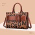 Cross border women's bag 2021 new European and American style letter pattern hand-held shoulder bag embossed large capacity crossbody bag, one piece dropshipping