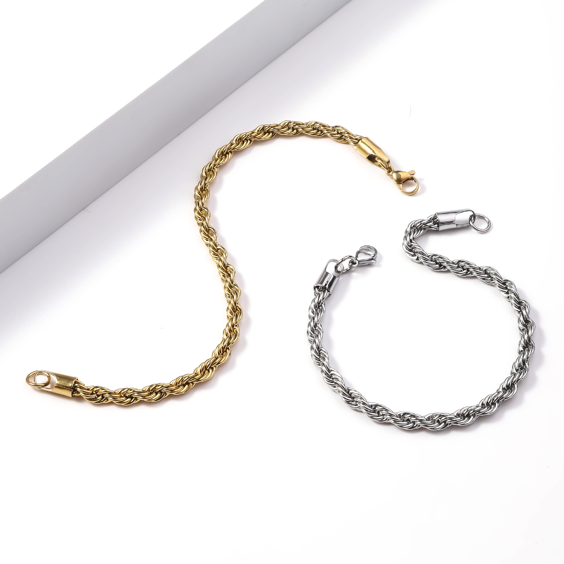 Cross border hot sale stainless steel Fried Dough Twists bracelet 18K real gold color preserving electroplating men's and women's titanium steel bracelet jewelry