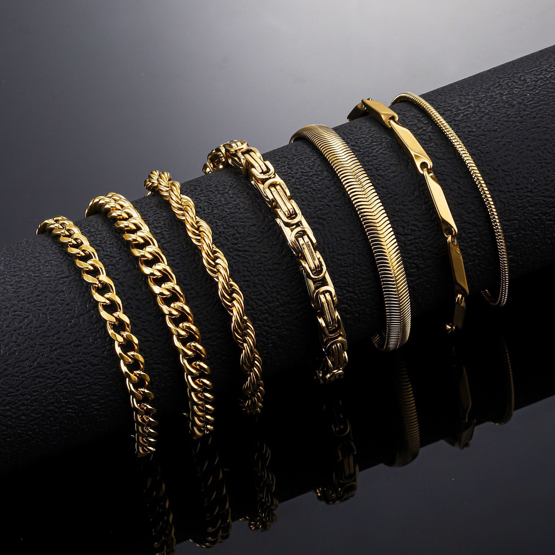 Cross border titanium steel golden Cuban bracelet popular in Europe and America men's snake bone chain plated with 18K real gold stainless steel bracelet for women