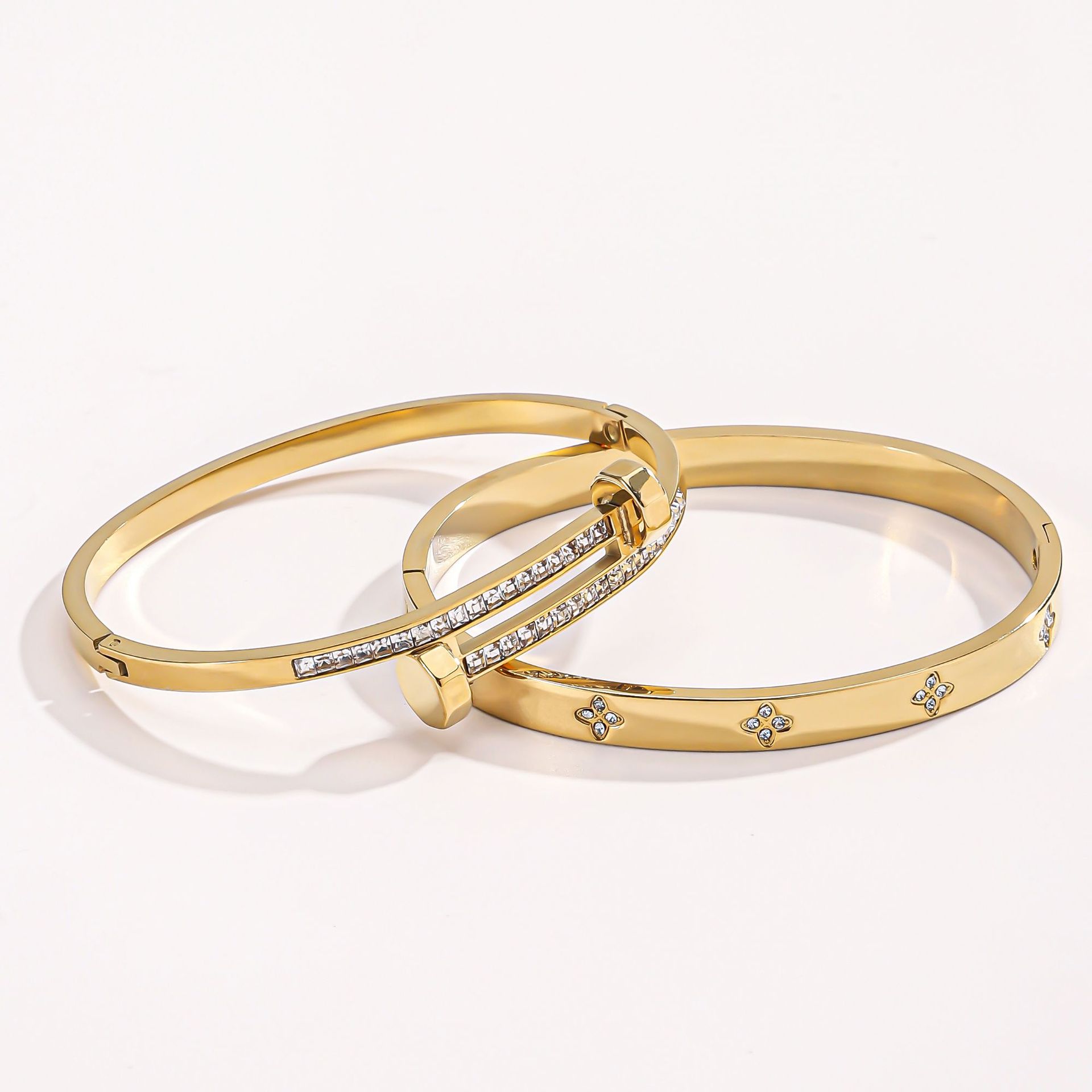 Cross border stainless steel bracelet, European and American women's double headed nail bracelet plated with 18K gold, versatile lucky grass titanium steel bracelet