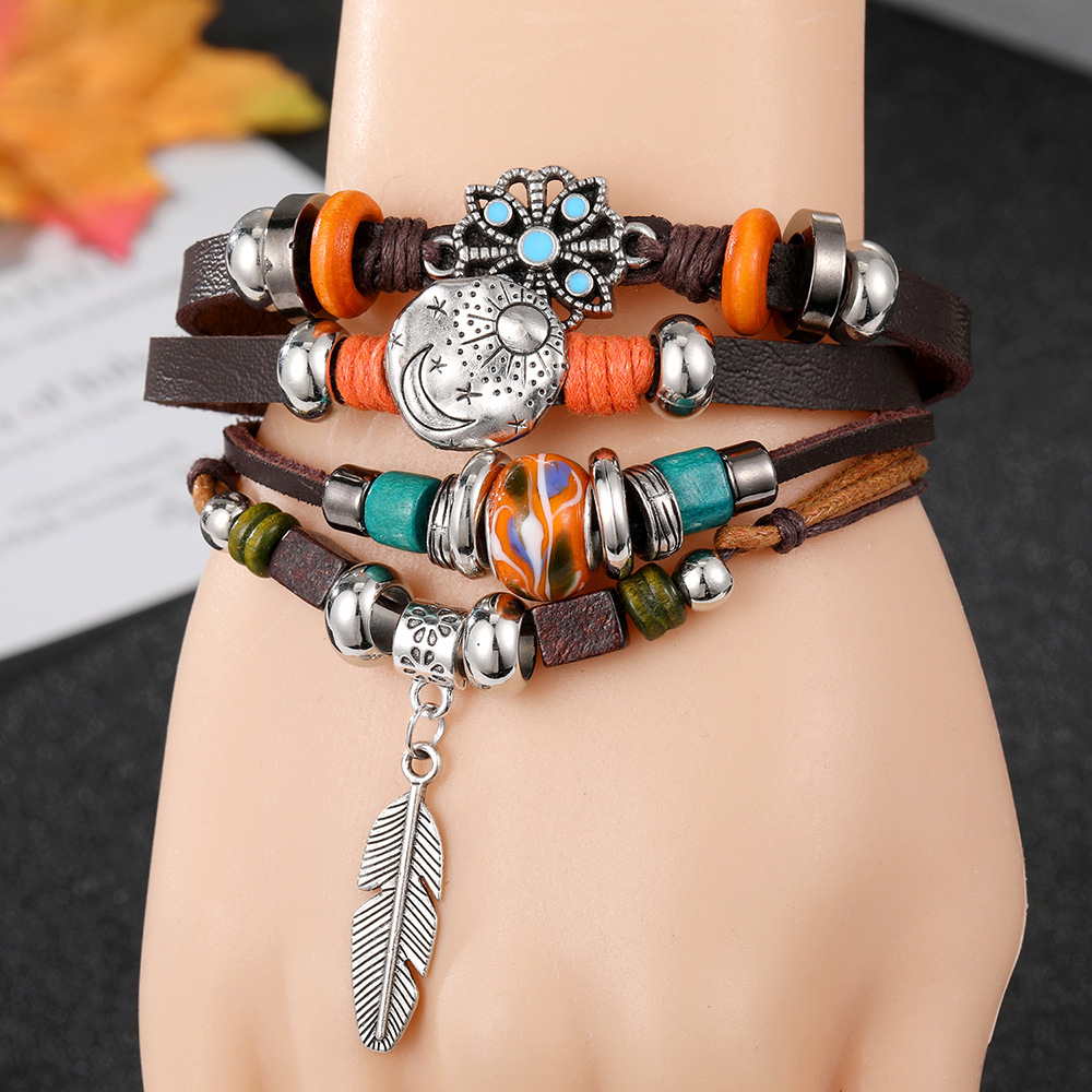 Imitation genuine leather bracelet, leather rope, wax rope bracelet, leaves, stars, moon bracelet, multi-layer pillar woven bracelet wholesale