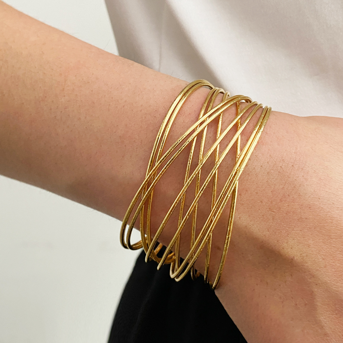 European and American popular fashion bracelet with minimalist personality, multi-layer hollow opening armband, niche, light luxury, geometric cross shaped bracelet