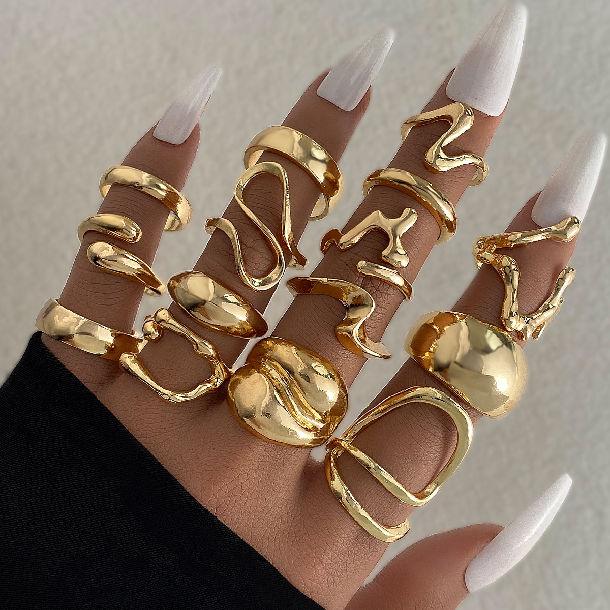 Cross border hot selling personalized exaggerated gold lava lines irregular water droplet smooth ring set in Europe and America, 15 piece set