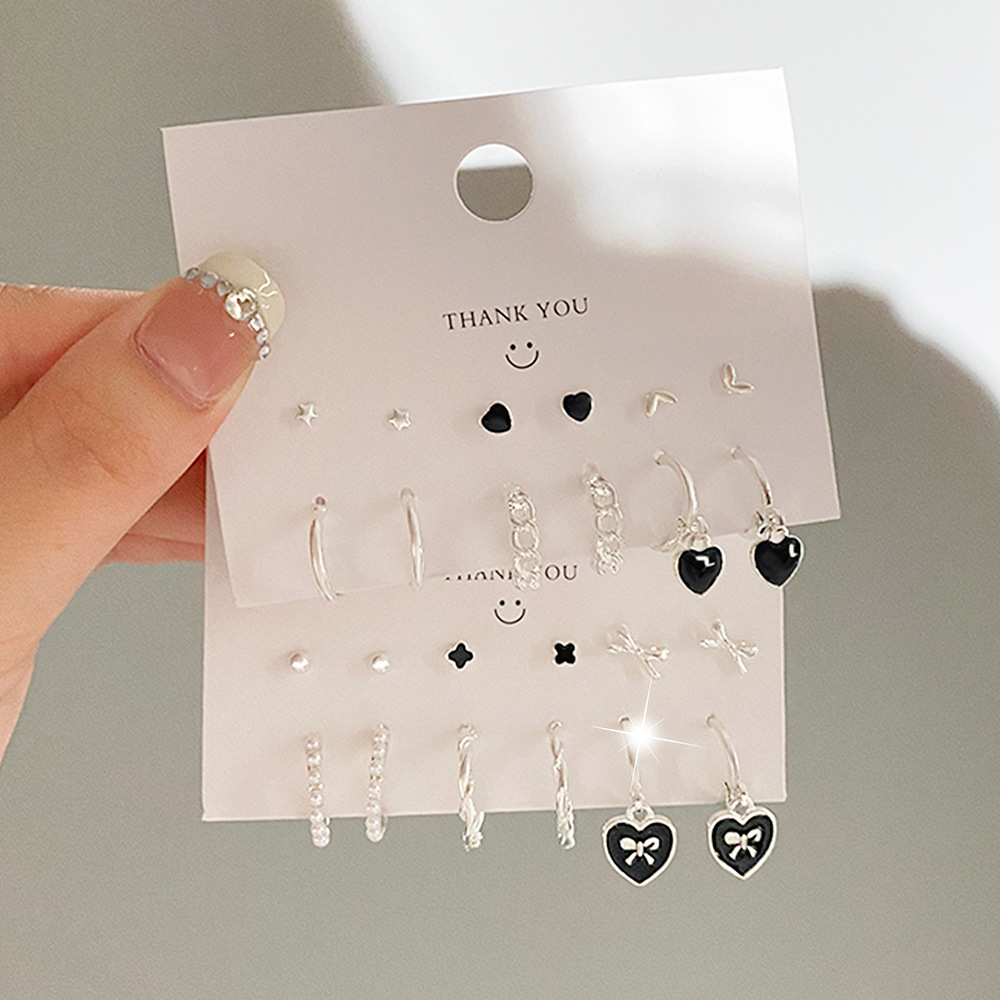 Cross border hot selling fashion trend dripping oil love butterfly imitation pearl earrings set for women in Europe and America