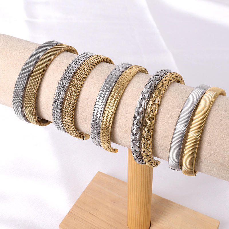 Cross border fashion stainless steel braided bracelet with high-end feel, no fading, versatile and open mouth jewelry wholesale