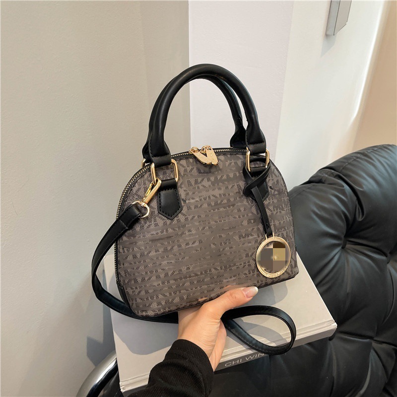 Shell bag large capacity factory goods 2025 new single shoulder crossbody handbag wholesale cross-border fashion contrasting letter trendy women's bag
