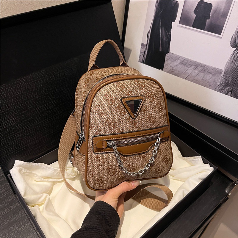 Cross border foreign trade women's bag printing 2025 new multi-purpose backpack, single shoulder diagonal cross hand-held chest bag, multi in one popular item