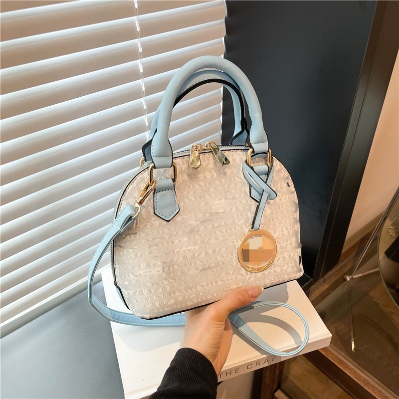 Shell bag large capacity factory goods 2025 new single shoulder crossbody handbag wholesale cross-border fashion contrasting letter trendy women's bag