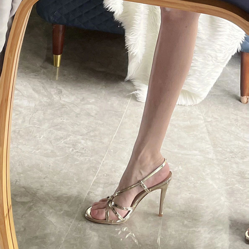 Golden strap high-heeled shoes for women in 2025, this year's new summer style with a single strap and slim heel, elegant ladies' sandals