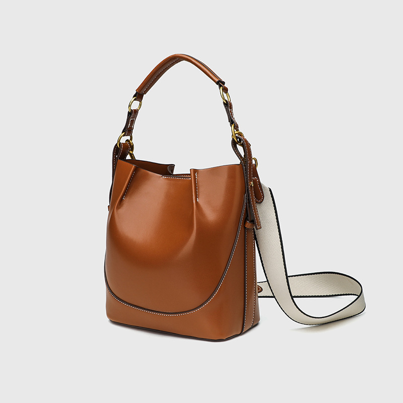 Cross border women's bag 2025 new large capacity wide shoulder strap single shoulder handbag brown drawstring hand-held crossbody bucket bag