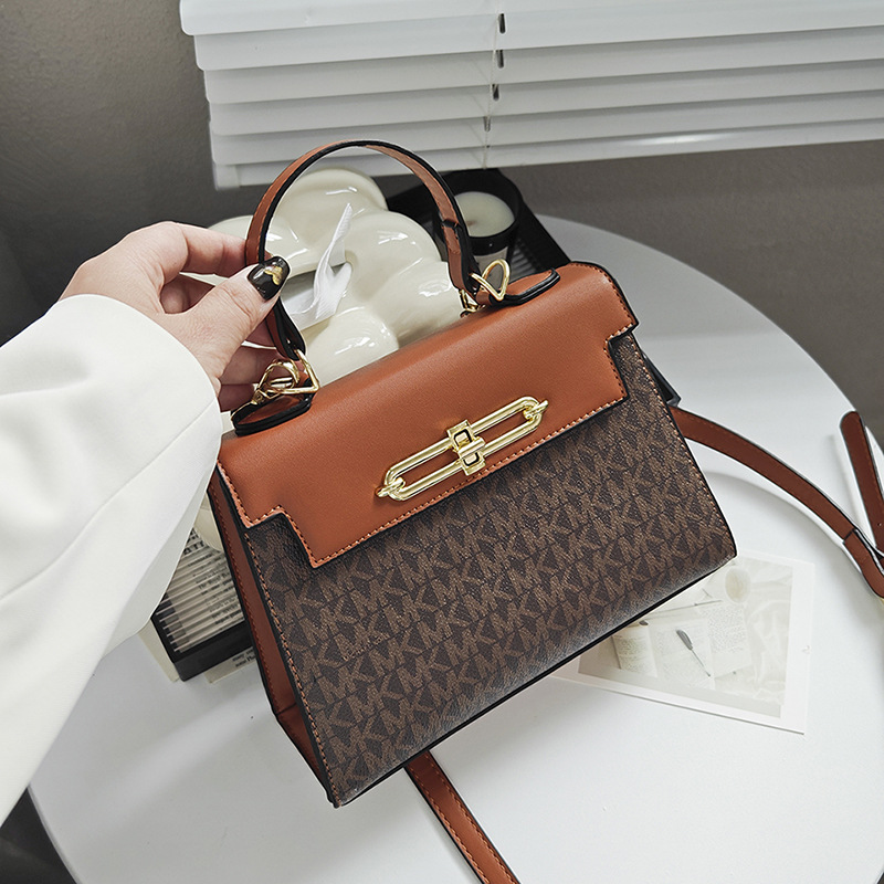 2025 New Kelly Bag Women's Single Shoulder Handheld Crossbody Small Square Bag Color Contrast Splicing Factory Goods Cross border Trendy Match for Foreign Trade