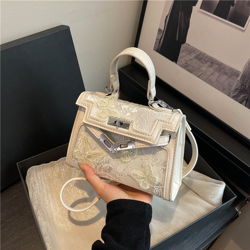 Advanced texture bag for women in spring 2025, new trendy and versatile hand-held small square bag, niche single shoulder crossbody bag