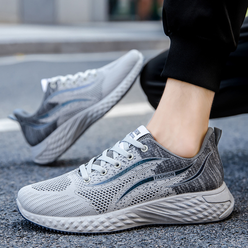 Cross border autumn new low top running shoes trend fly woven breathable casual shoes men's sports shoes lace up men's shoes wholesale