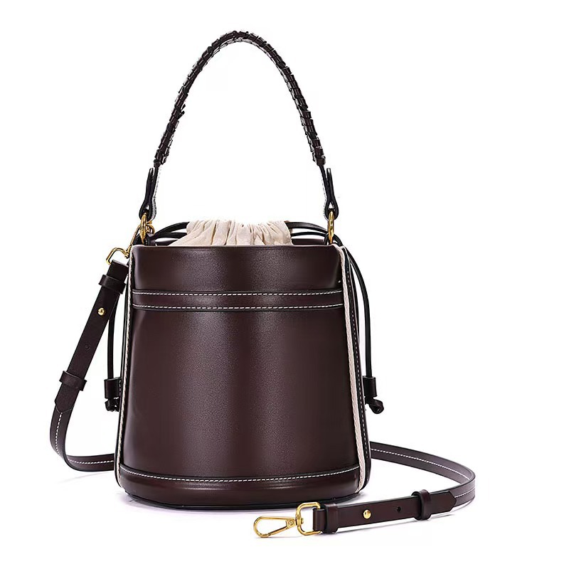 Z family cross-border cylindrical bag for women 2025 new niche design, two handed lifting fashionable commuting single shoulder crossbody bucket bag