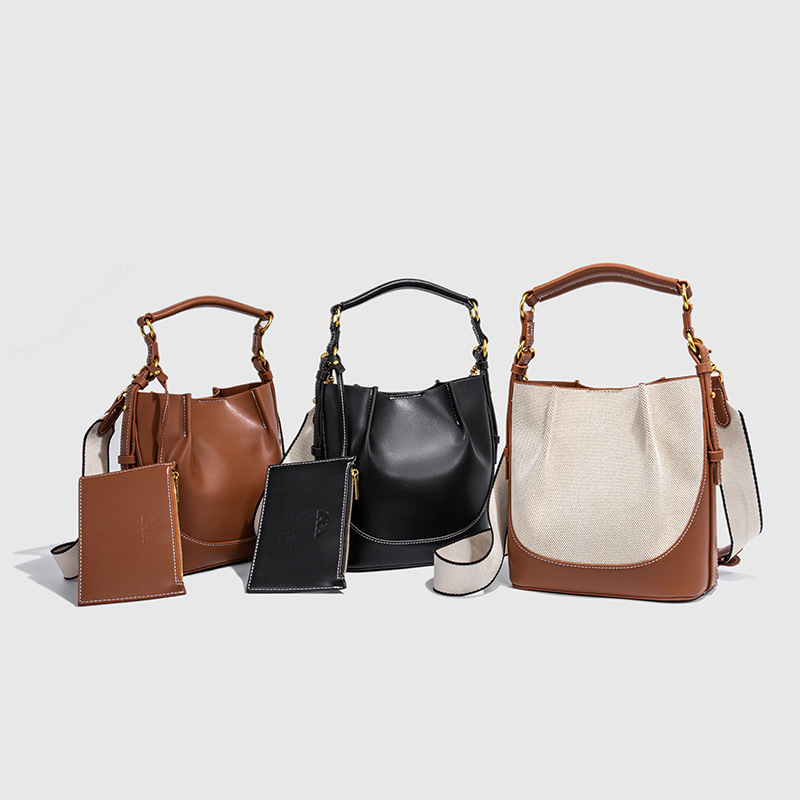 Cross border Women's Bag 2025 New Large Capacity Wide Shoulder Strap Single Shoulder Handbag with Bundle Mouth Handheld Crossbody Bucket Bag