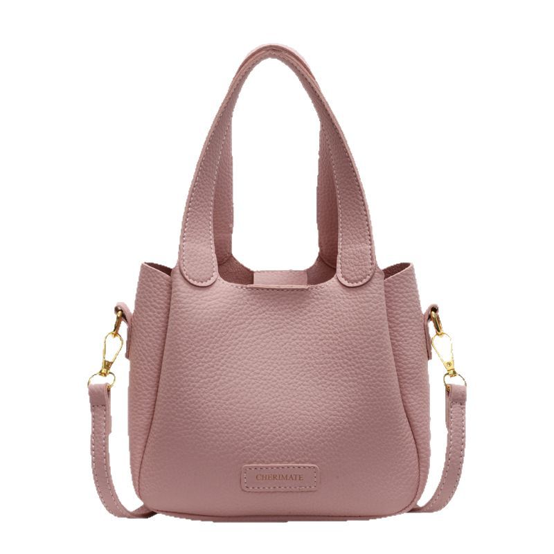Korean version commuting handbag for women in spring 2025, new niche and simple bucket bag, fashionable and versatile single shoulder crossbody bag