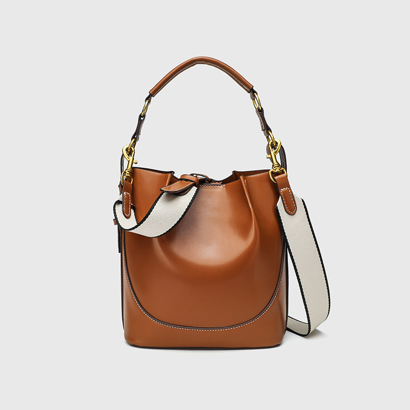 Cross border women's bag 2025 new large capacity wide shoulder strap single shoulder handbag brown drawstring hand-held crossbody bucket bag