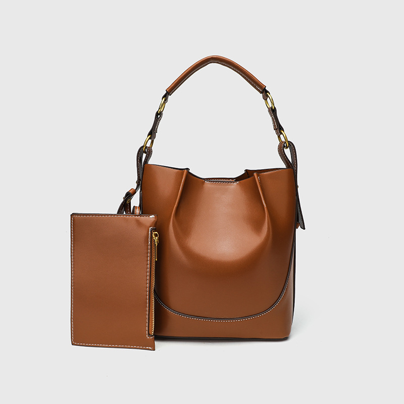Cross border women's bag 2025 new large capacity wide shoulder strap single shoulder handbag brown drawstring hand-held crossbody bucket bag