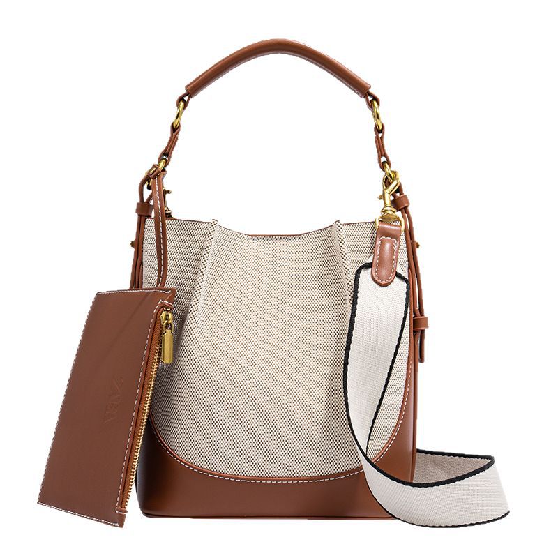 Cross border Women's Bag 2025 New Large Capacity Wide Shoulder Strap Single Shoulder Handbag with Bundle Mouth Handheld Crossbody Bucket Bag