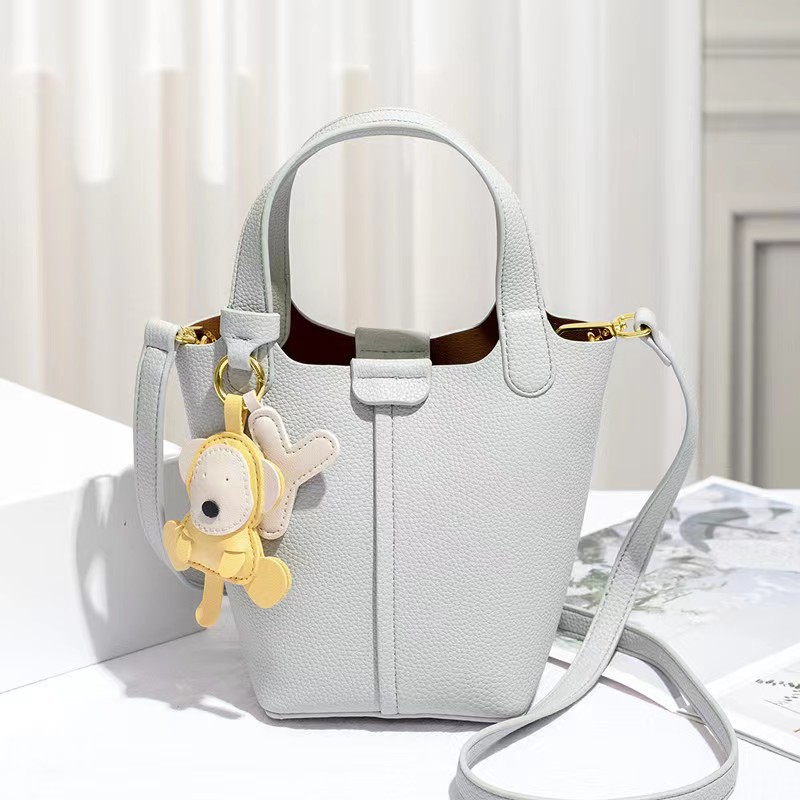 Cross border new product bag, niche vegetable basket bag, water bucket bag, fashionable doll hanging bag, large capacity hand-held crossbody bag