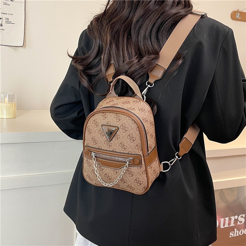 Cross border foreign trade women's bag printing 2025 new multi-purpose backpack, single shoulder diagonal cross hand-held chest bag, multi in one popular item