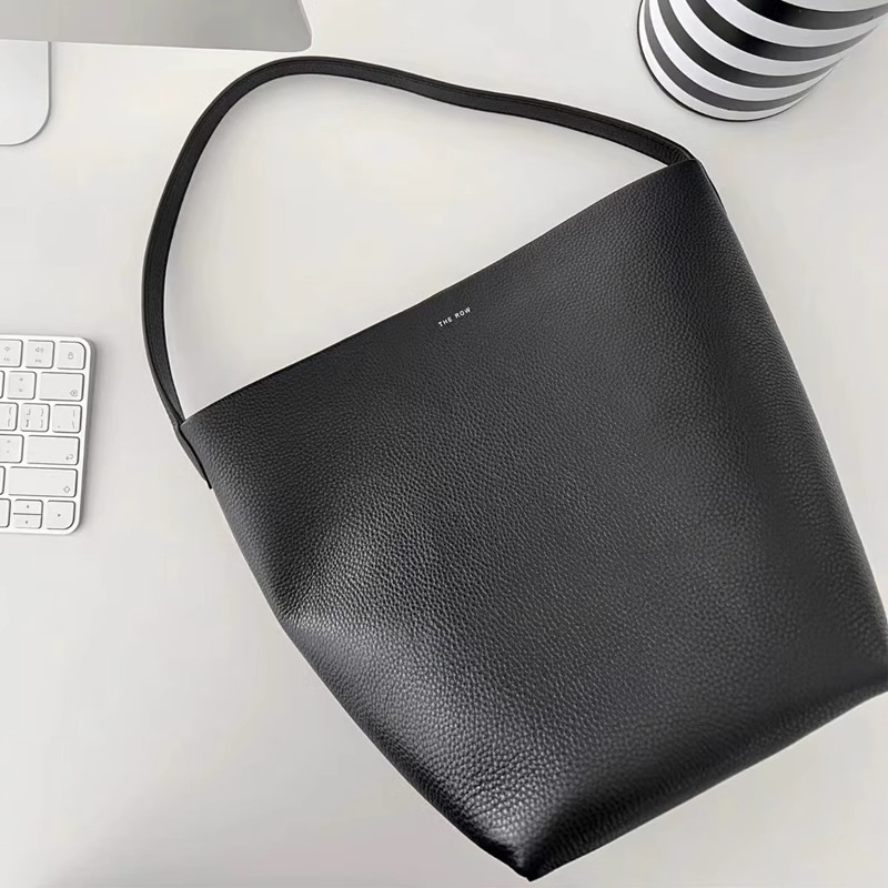 Leather large capacity bucket bag for women 2024 new model, popular this year, top layer cowhide niche shoulder bag, commuting bag for women