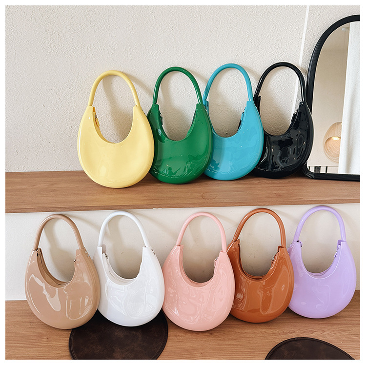 2025 New Fashionable Bent Moon Handheld Jelly Bag PVC Trendy Single Shoulder Handheld Women's Bag Simple Lacquer Leather Bag