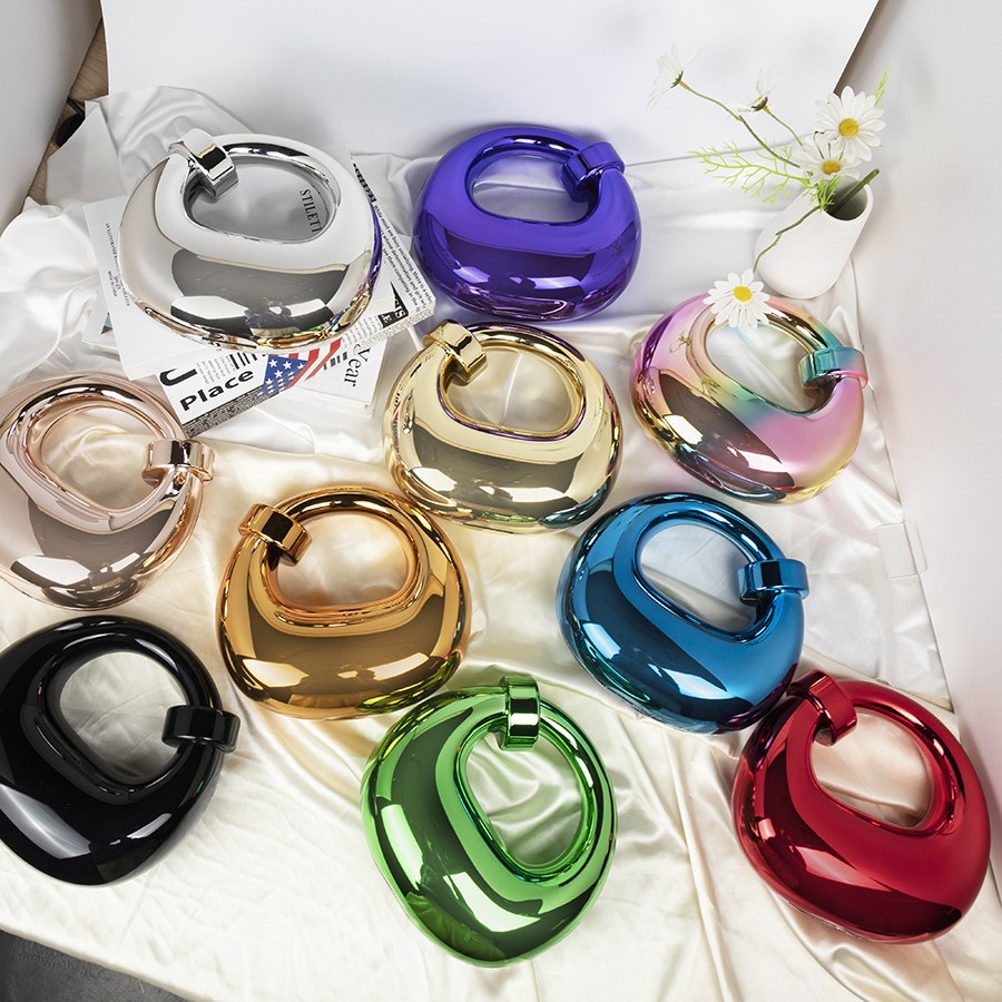 2025 European and American Cross border New Product High end Bent Moon Bag Fashion Atmosphere Acrylic Bag Home Decoration Candy Handbag