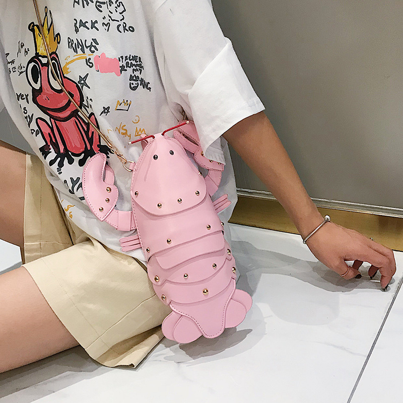 Cross border cute small bag for women 2025 new crossbody creative rivet Korean version fashionable versatile funny personality women's bag
