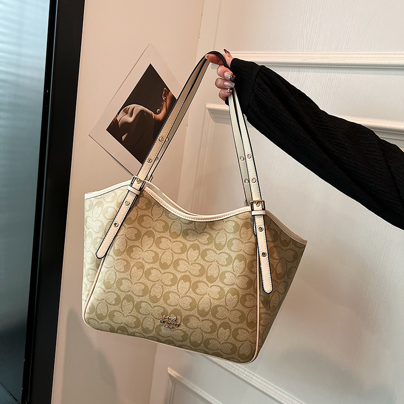Cross border large capacity women's bag 2025 trend versatile European and American shoulder bag printed fashionable retro casual tote bag trend
