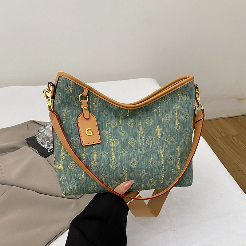 2025 New Bag Women's Cross border Tote Bag Cowboy Printed Women's Shoulder Bag Color Atmosphere Commuter Crossbody Bag Women