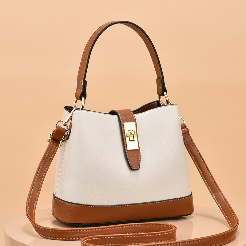 Handheld bucket bag for women, 2025 autumn new style, niche texture, large capacity single shoulder crossbody bag