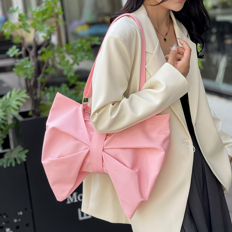 Korean version bow women's bag 2025 new fashionable pleated shoulder bag Instagram internet famous large capacity crossbody armpit bag